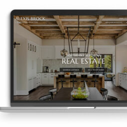 example realtor website on a floating laptop